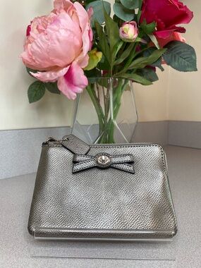 Coach Corner Zip Bow Turn Lock Wrislet